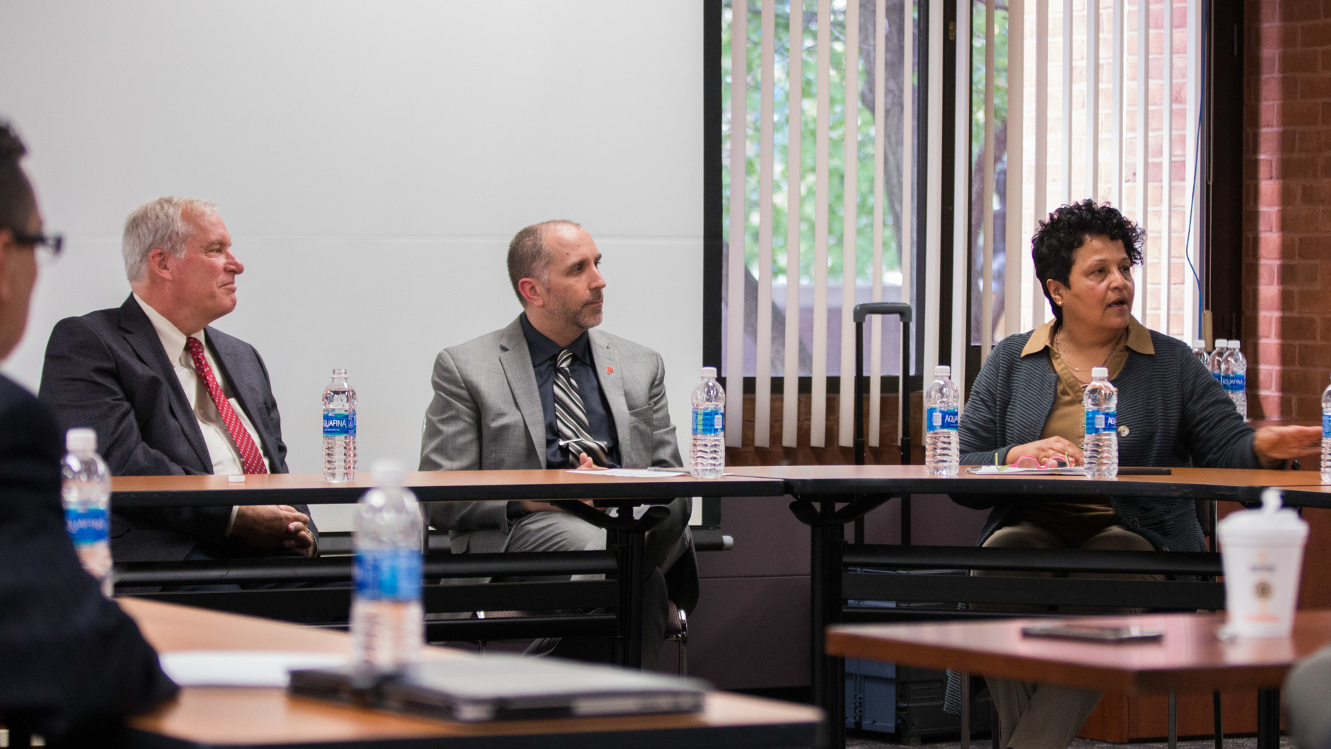 Photo of Eric S. Rosengren listening to Providence which one was on the winning teams selected to recieve the award.